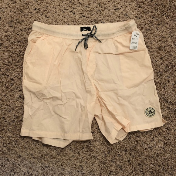 light pink swim trunks